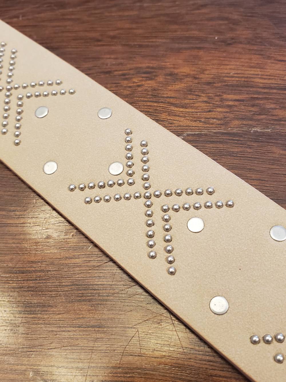 Studded Beige Leather Belt with Metallic Accents